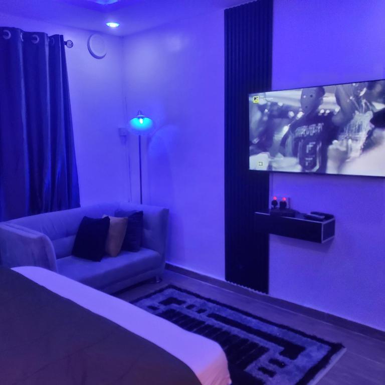 Postel nebo postele na pokoji v ubytování Weltons Apartments