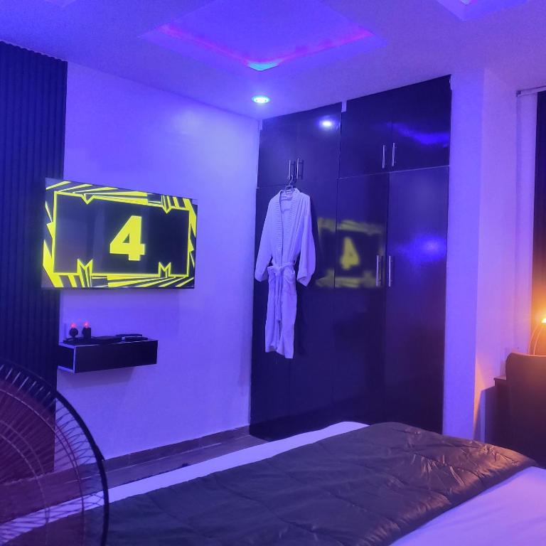 Postel nebo postele na pokoji v ubytování Weltons Apartments