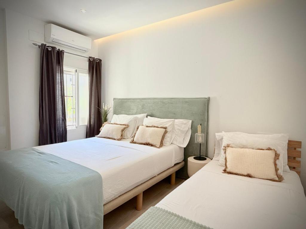 Posteľ alebo postele v izbe v ubytovaní Apartamento Playa Valencia Beach