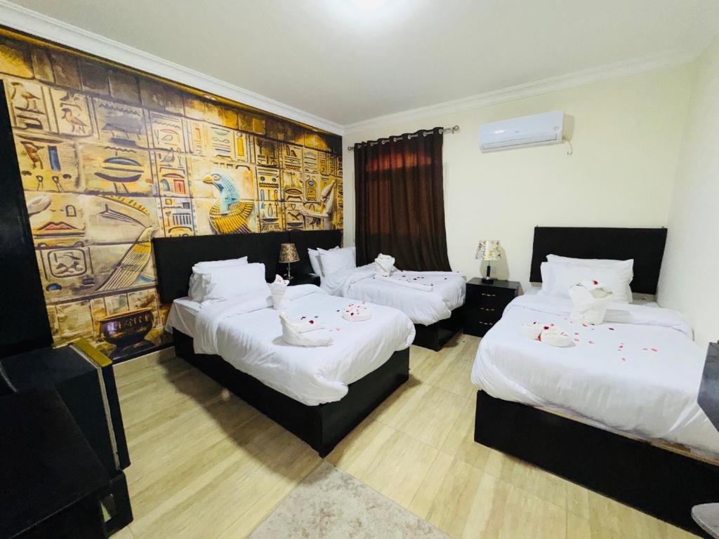 Katil atau katil-katil dalam bilik di Phoenix Pyramids View Inn