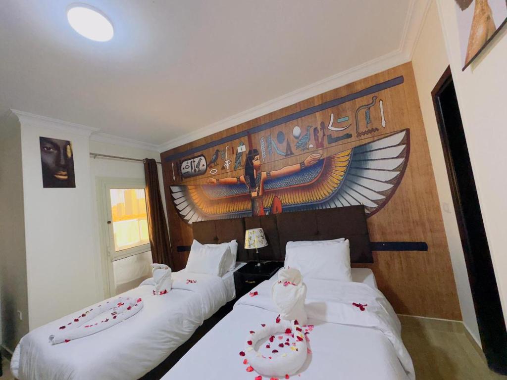 Katil atau katil-katil dalam bilik di Phoenix Pyramids View Inn