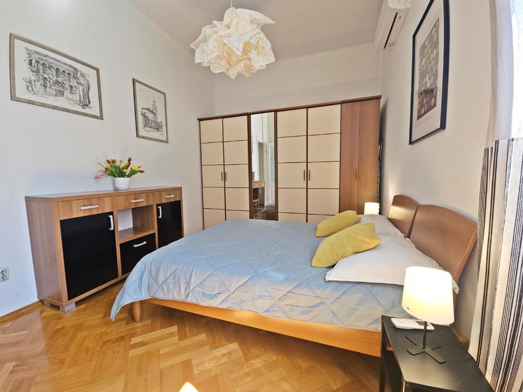 Posteľ alebo postele v izbe v ubytovaní Apartment Reful