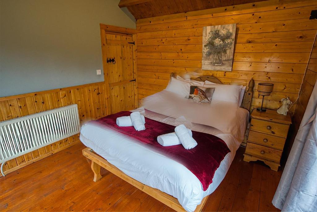 Postel nebo postele na pokoji v ubytování Red Robin Nest
