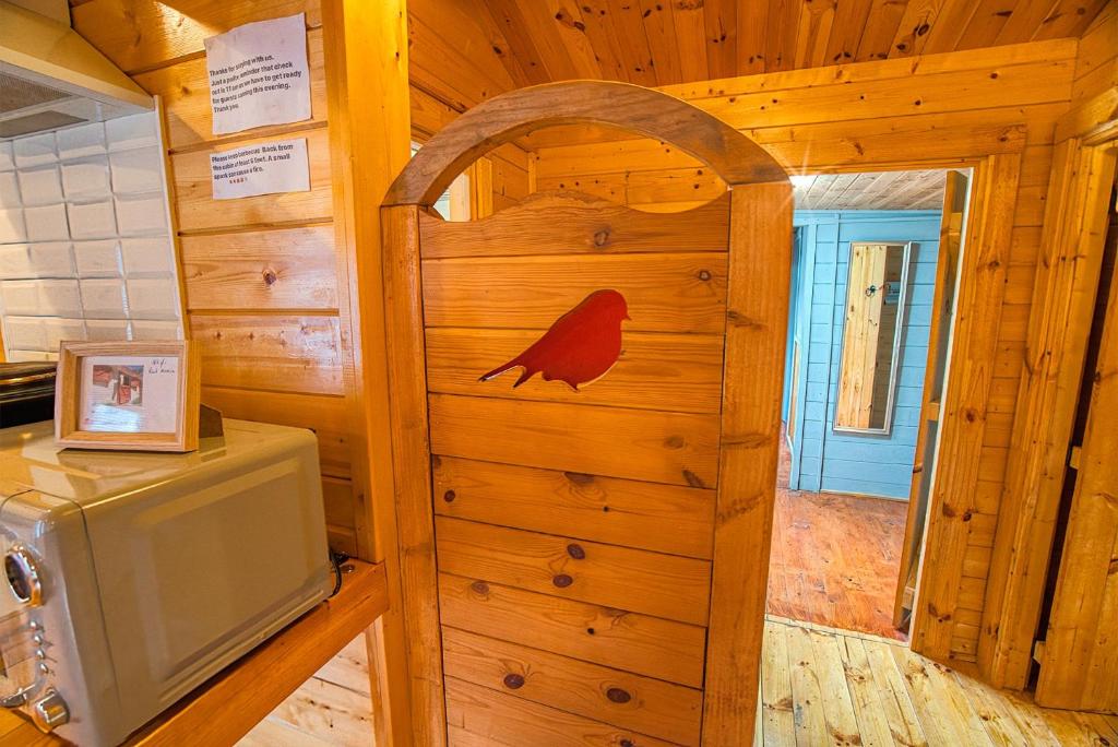 Kuchyň nebo kuchyňský kout v ubytování Red Robin Nest