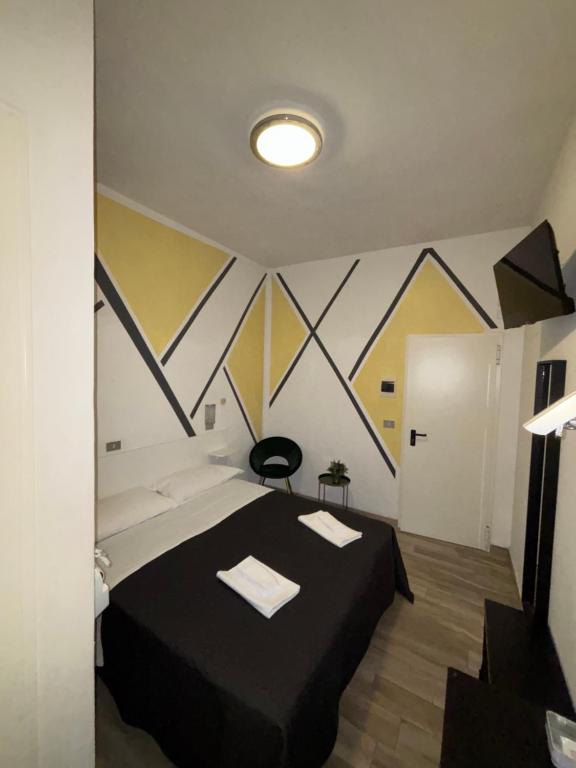 Postel nebo postele na pokoji v ubytování WuHostel