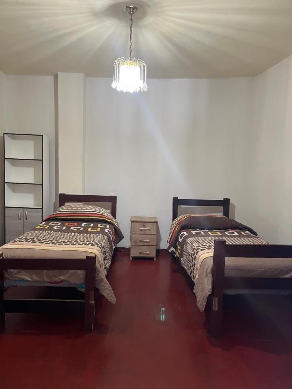 Ένα ή περισσότερα κρεβάτια σε δωμάτιο στο Habitación doble, baño privado, 10 cuadras Plaza de Armas