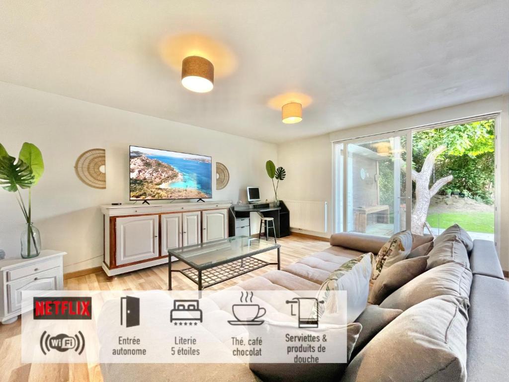 O zonă de relaxare la 34 - Maison de plain pied & son jardin verdoyant proximité Vieux Lille