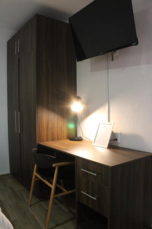 TV a/nebo společenská místnost v ubytování Lofts Las Fuentes