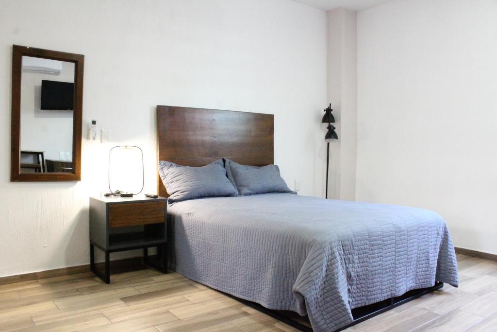 Postel nebo postele na pokoji v ubytování Lofts Las Fuentes