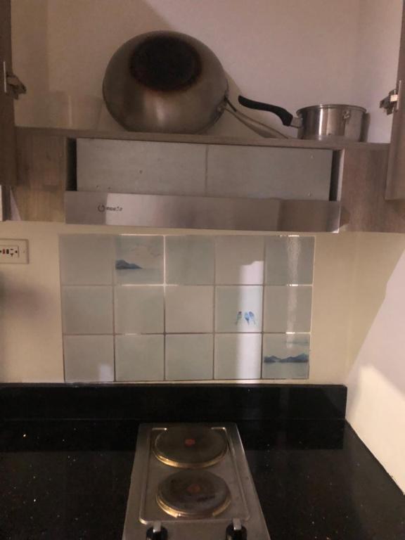 Kuchyň nebo kuchyňský kout v ubytování Staycation