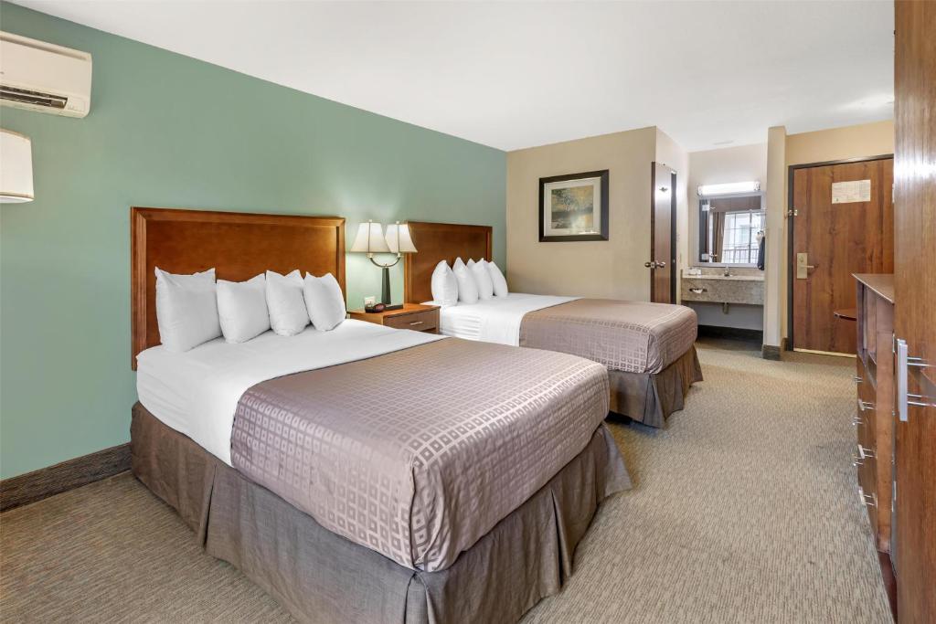 Postel nebo postele na pokoji v ubytování Best Western Plus Atrium Inn