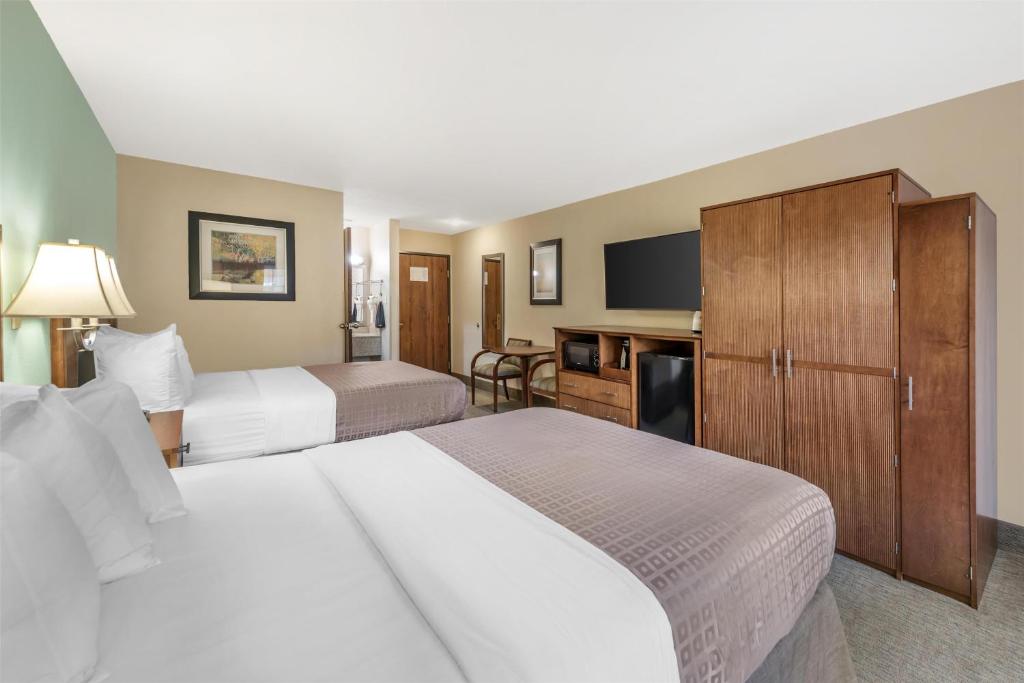 Postel nebo postele na pokoji v ubytování Best Western Plus Atrium Inn