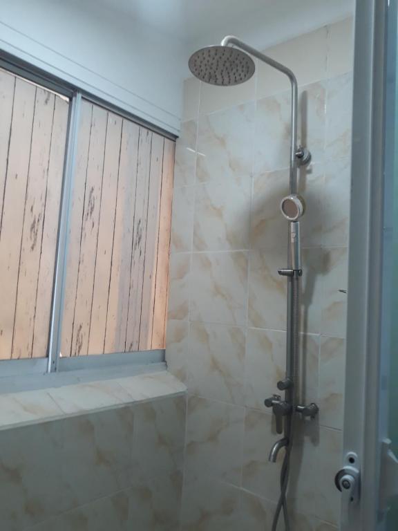 Koupelna v ubytování 999 Hotel
