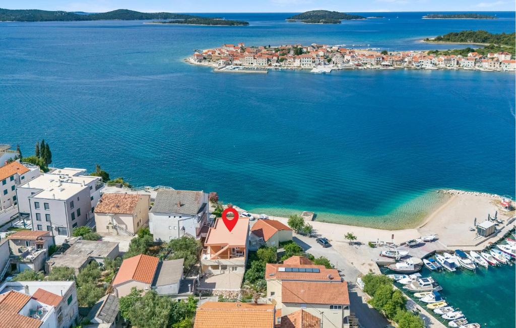 an aerial view of a town with boats in the water at 2 Bedroom Nice Apartment In Brodarica in Brodarica