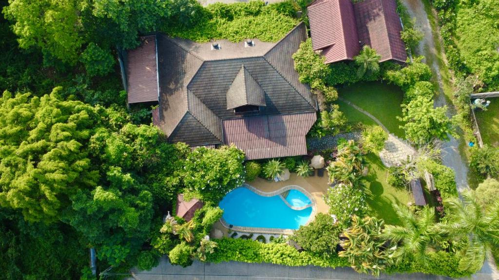 Bazén v ubytování Homestay Chiangrai nebo v jeho okolí