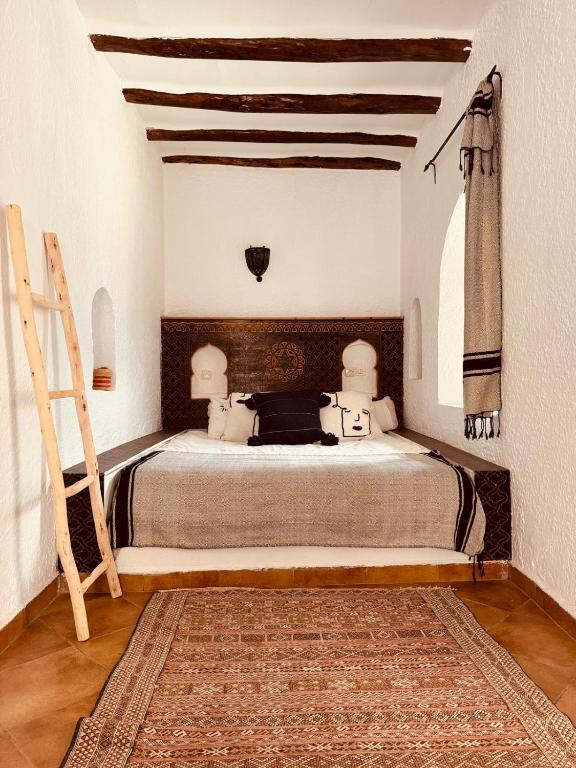 Postel nebo postele na pokoji v ubytování Riad Eucalyptus, Ethnic Hotel