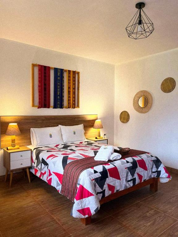 Postel nebo postele na pokoji v ubytování Tambo Lodge Canta
