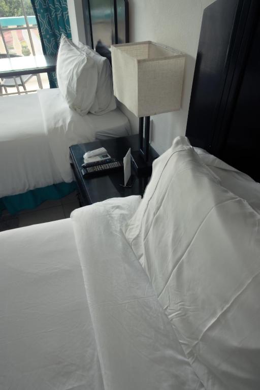Una cama o camas en una habitación de Match Resort
