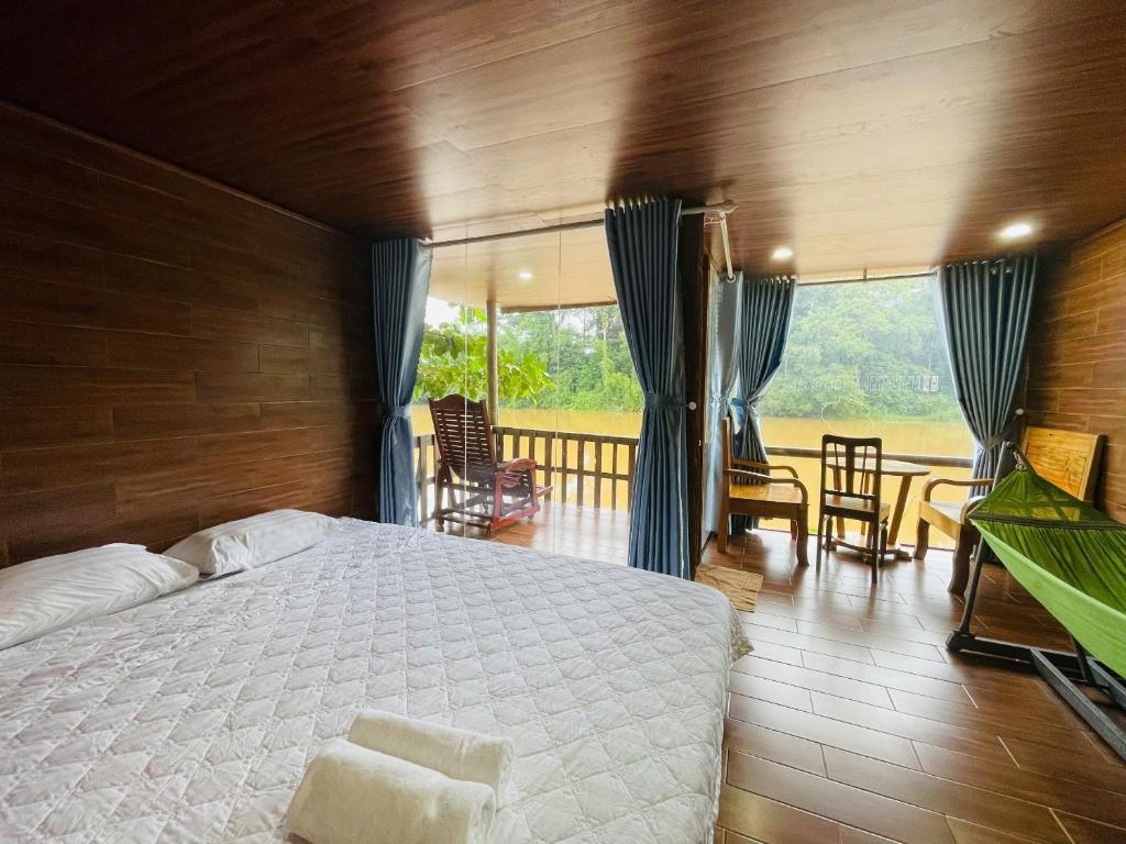 Postel nebo postele na pokoji v ubytování Green Bamboo Lodge Resort