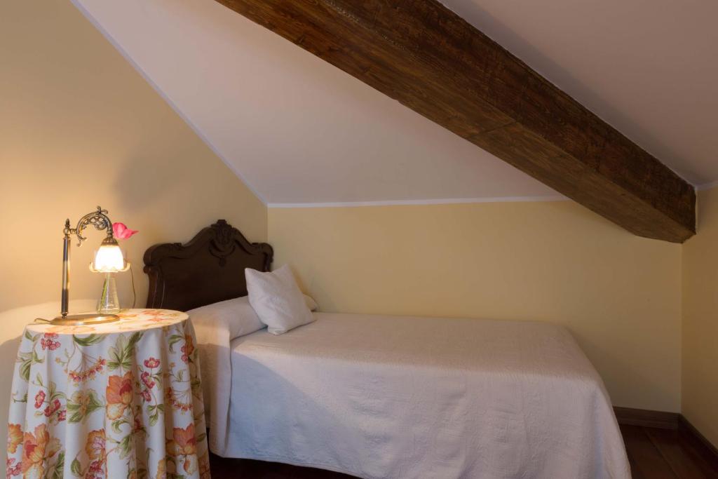 Cama o camas de una habitación en La Casona de la Roza