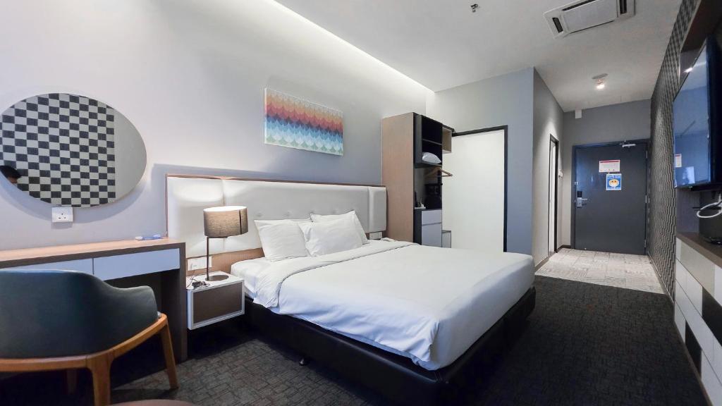 Postel nebo postele na pokoji v ubytování Fives Hotel DNP