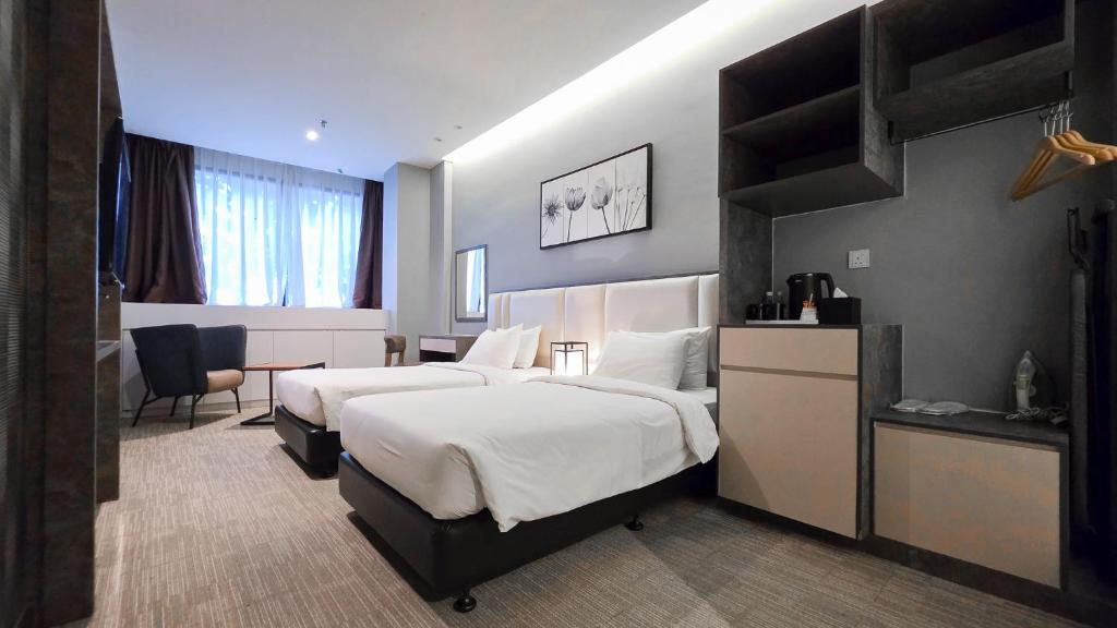 Postel nebo postele na pokoji v ubytování Fives Hotel DNP