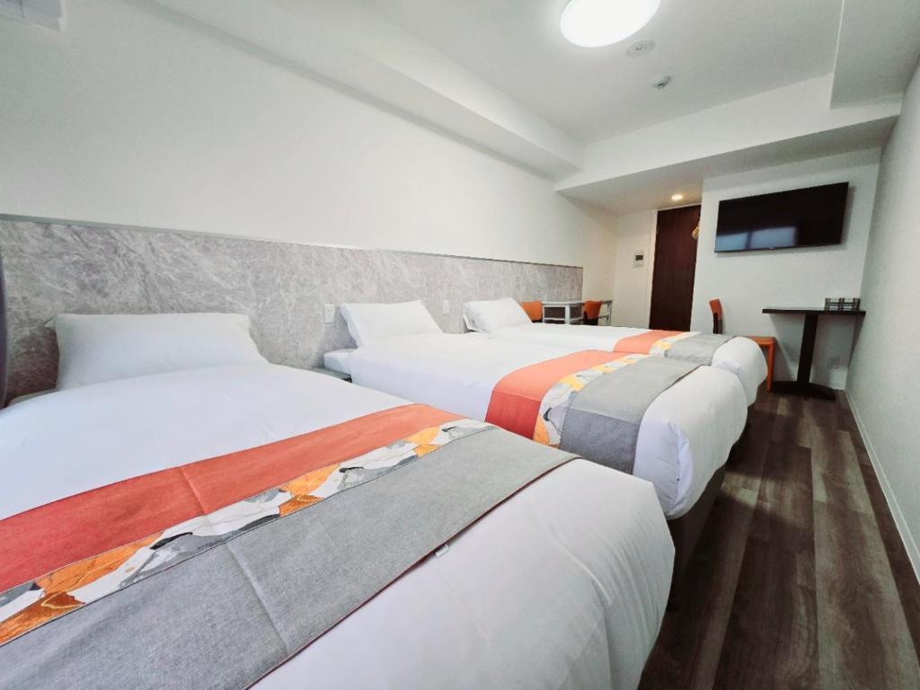 Ένα ή περισσότερα κρεβάτια σε δωμάτιο στο Hotel Arashi Tengachaya No005