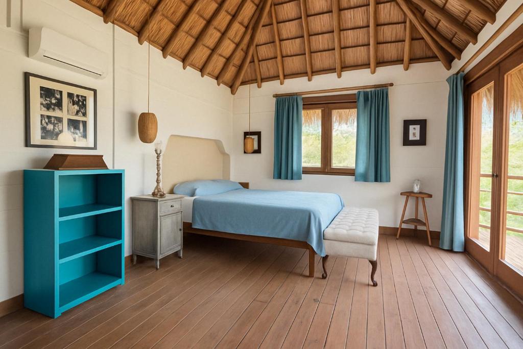 Postel nebo postele na pokoji v ubytování Hacienda San Benito