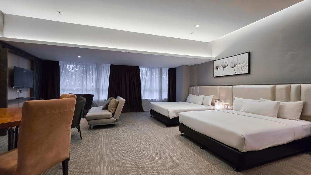 Postel nebo postele na pokoji v ubytování Fives Hotel DNP