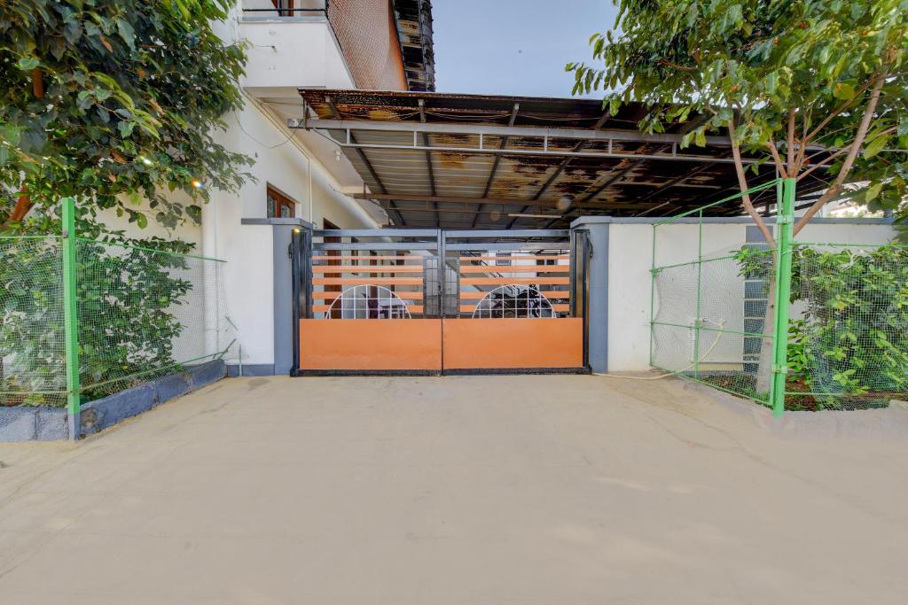 Fotografie z fotogalerie ubytování Hotel O SMS HOMES v destinaci Kójamputtúr