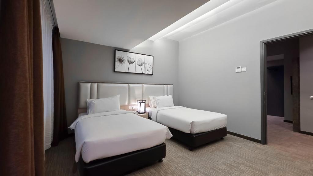 Postel nebo postele na pokoji v ubytování Fives Hotel DNP