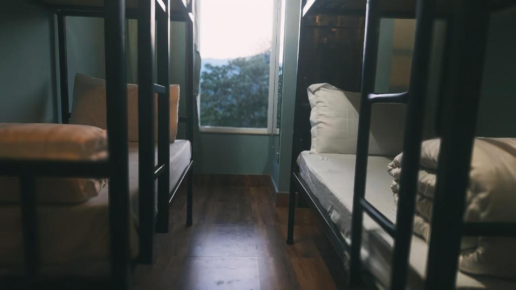 Postel nebo postele na pokoji v ubytování Zemu Gangtok