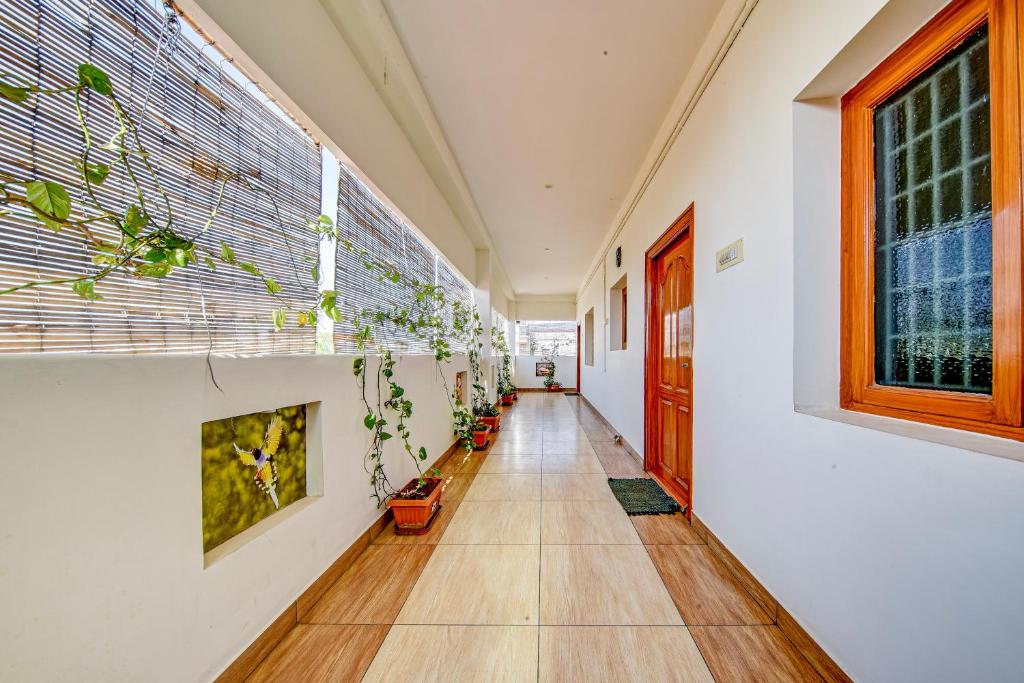 Fotografie z fotogalerie ubytování Hotel O SMS HOMES v destinaci Kójamputtúr