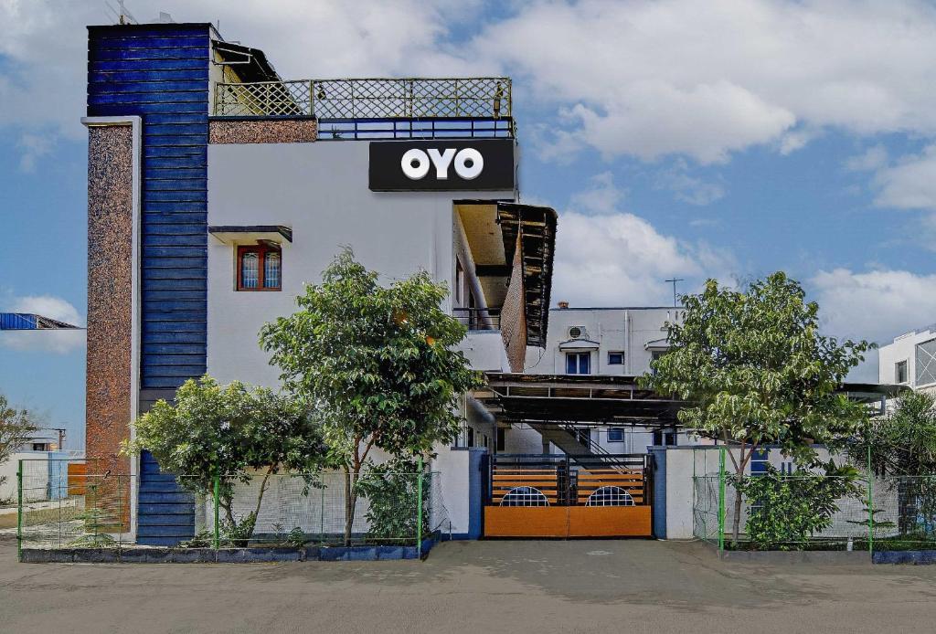 Fotografie z fotogalerie ubytování Hotel O SMS HOMES v destinaci Kójamputtúr