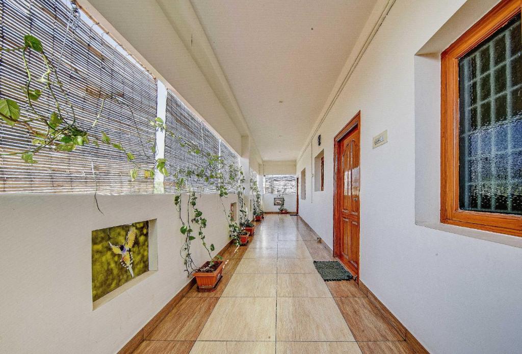 Fotografie z fotogalerie ubytování Hotel O SMS HOMES v destinaci Kójamputtúr