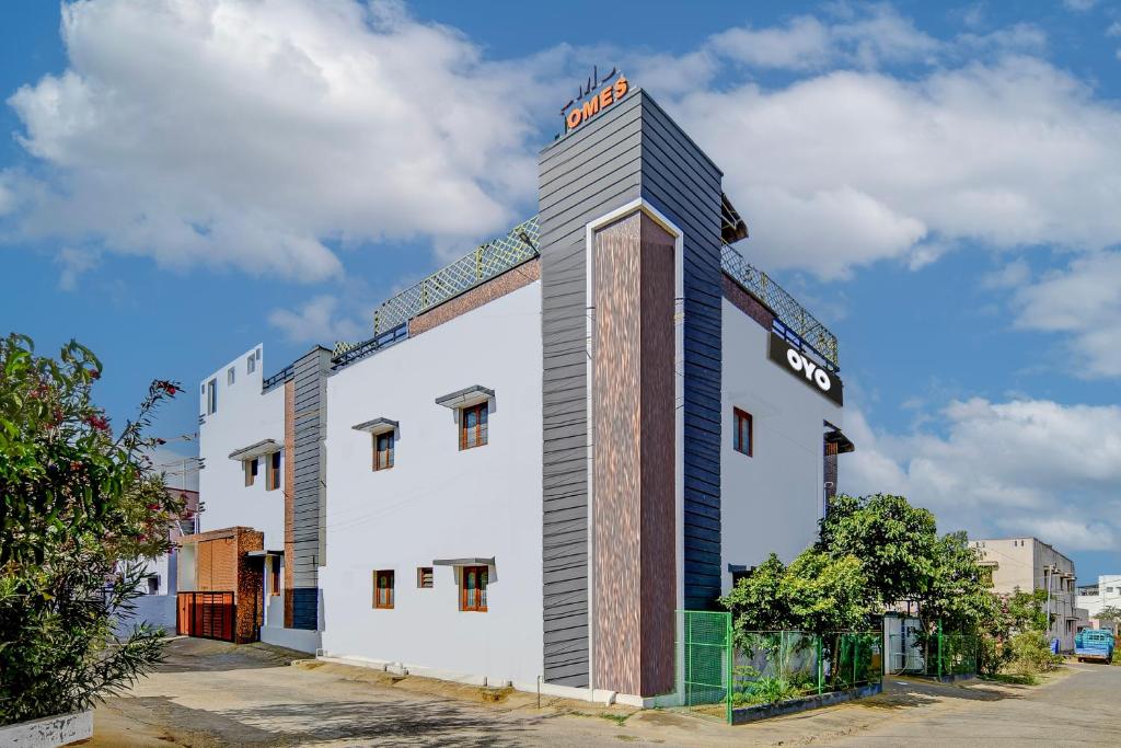 Fotografie z fotogalerie ubytování Hotel O SMS HOMES v destinaci Kójamputtúr