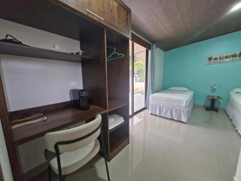 Postel nebo postele na pokoji v ubytování Hotel Carlota Tamarindo