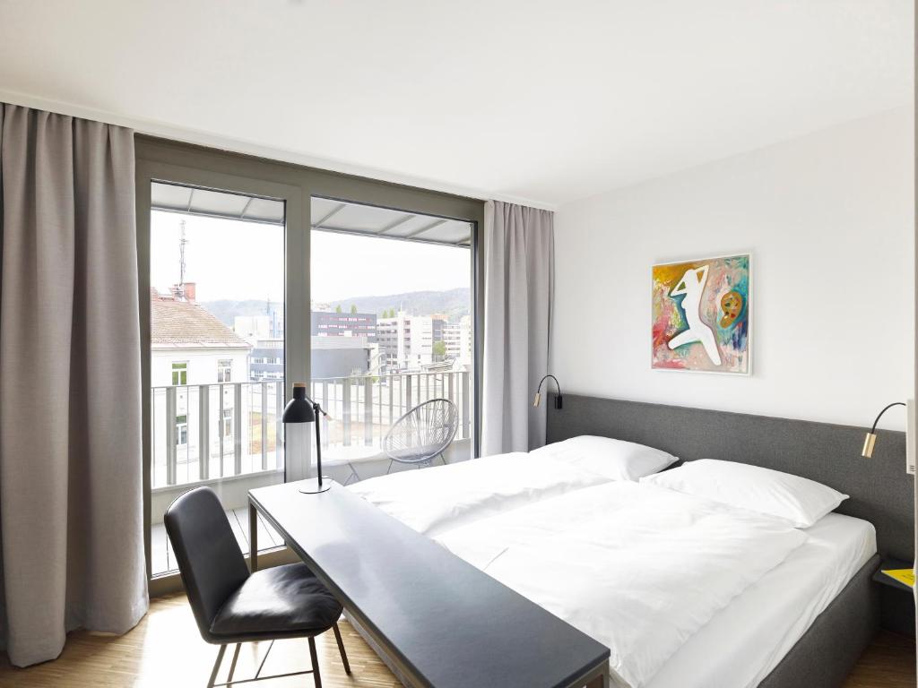 Voodi või voodid majutusasutuse Lendhotel toas