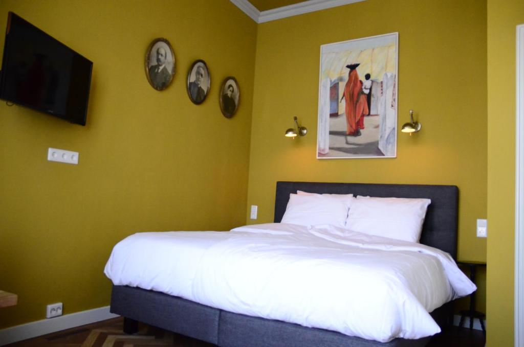 Postel nebo postele na pokoji v ubytování Hotel Sleep-Inn Box 5