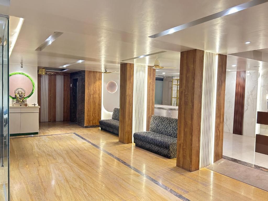 Posezení v ubytování Hotel Krishna Sai Kutir