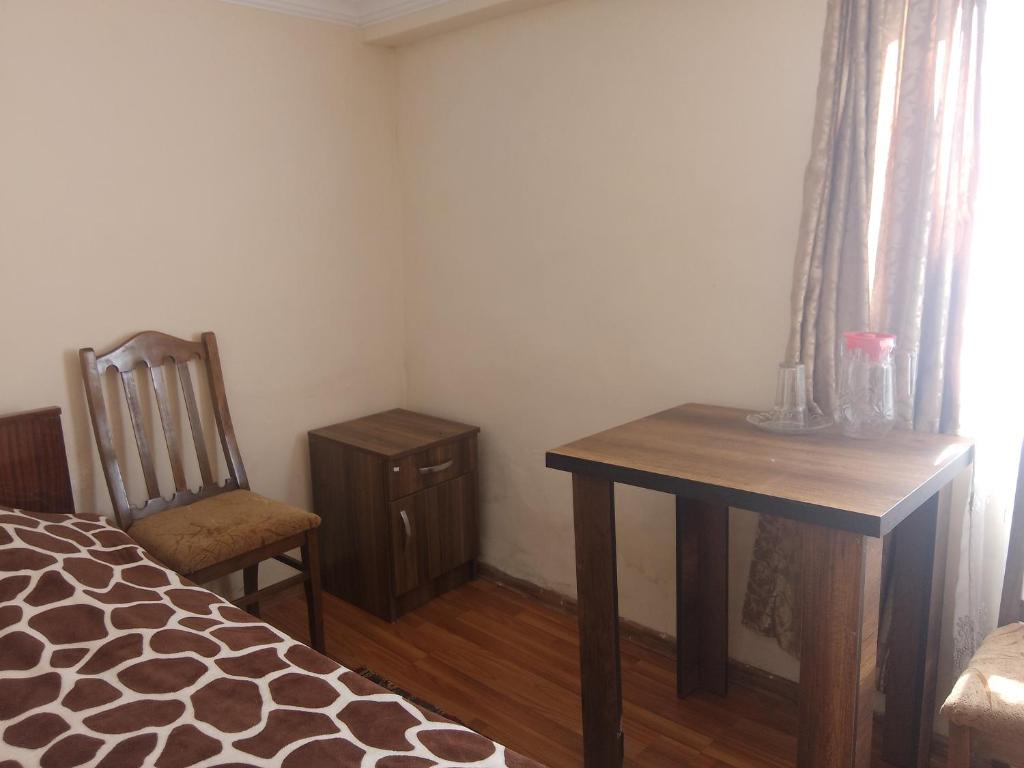 Postel nebo postele na pokoji v ubytování Nunu's Guesthouse