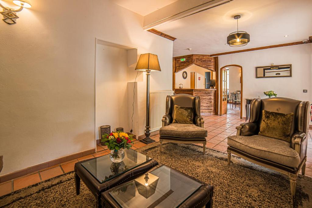 Posezení v ubytování Hôtel Le Belvédère