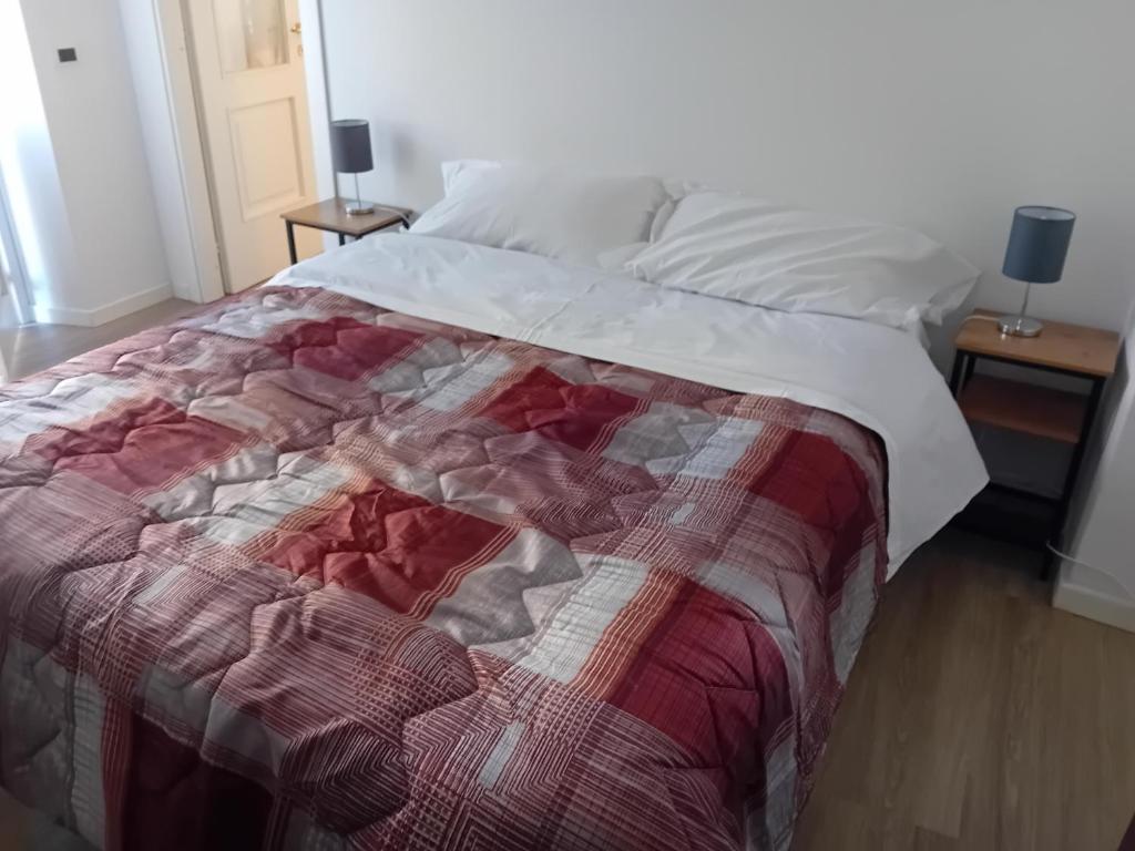 Posteľ alebo postele v izbe v ubytovaní Romeo and Juliet Apartaments