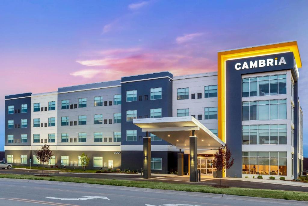 an office building with acanaria sign in front of it at Cambria Hotel Davenport Quad Cities in Bettendorf