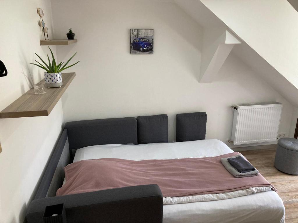 Posteľ alebo postele v izbe v ubytovaní Rabbit apartman
