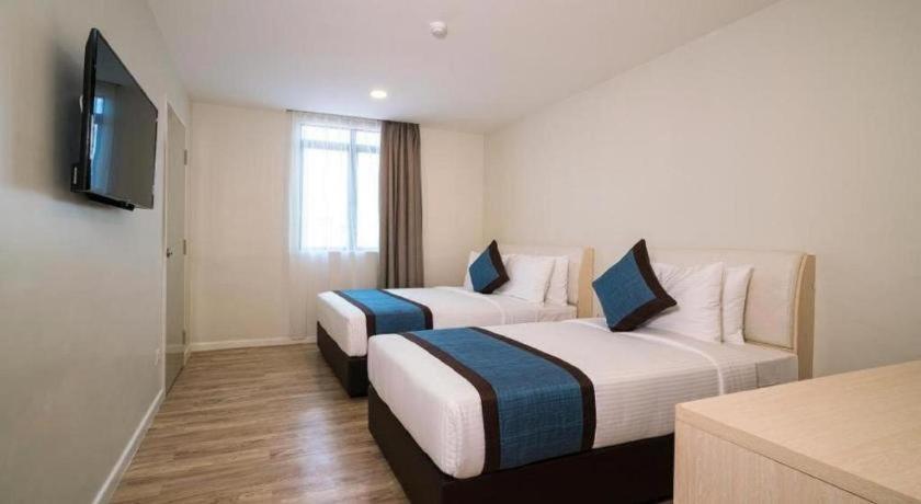 Innspire by Suntai (Previously known as WG Hotel)にあるベッド