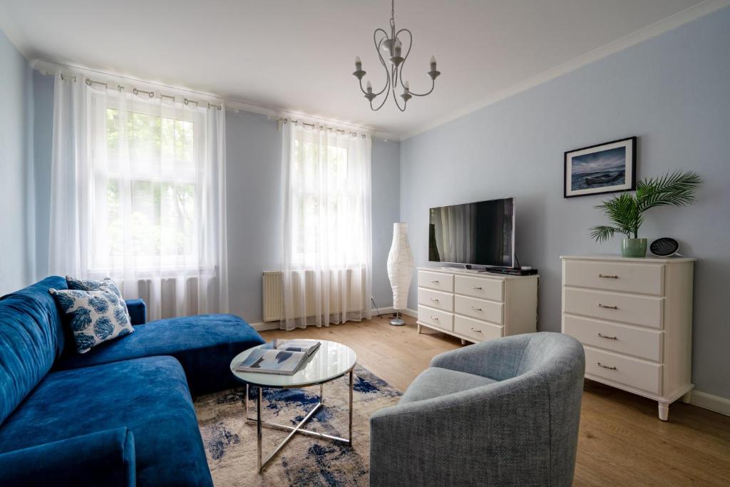 Televízia a/alebo spoločenská miestnosť v ubytovaní Twoje Miejsce przy Plaży - Parkowa 33A2 by Lion Apartments Sopot