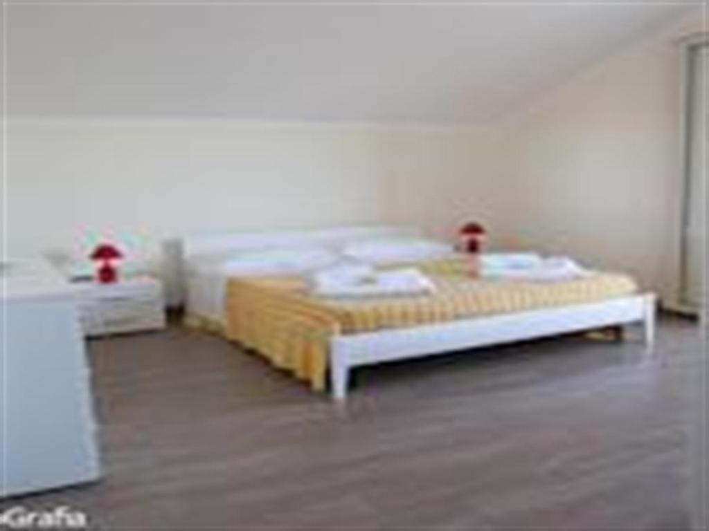 Łóżko lub łóżka w pokoju w obiekcie Residence Fronte Mare