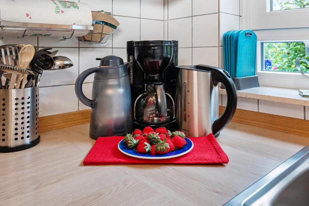 Příslušenství pro přípravu čaje a kávy v ubytování Ferienwohnung Zapf