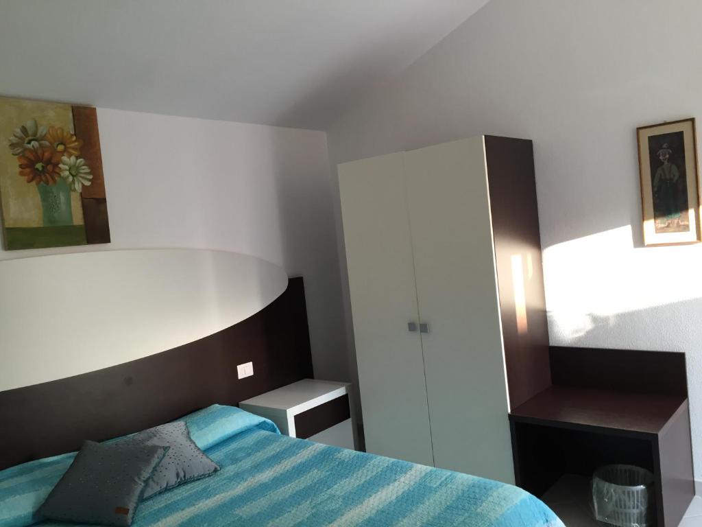 Posteľ alebo postele v izbe v ubytovaní Residence Olbia
